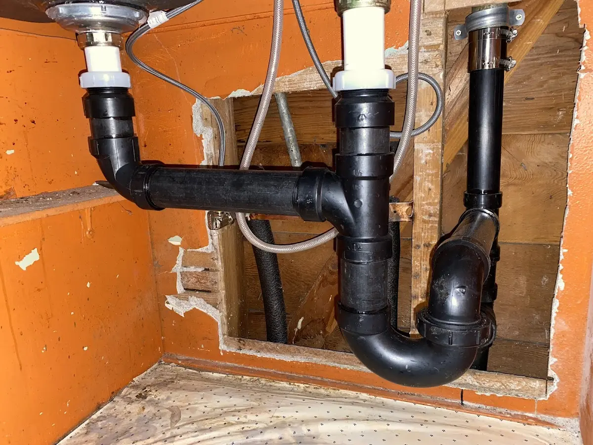 Professional Garbage Disposal Repair equipment and tools on the job in Carthage
